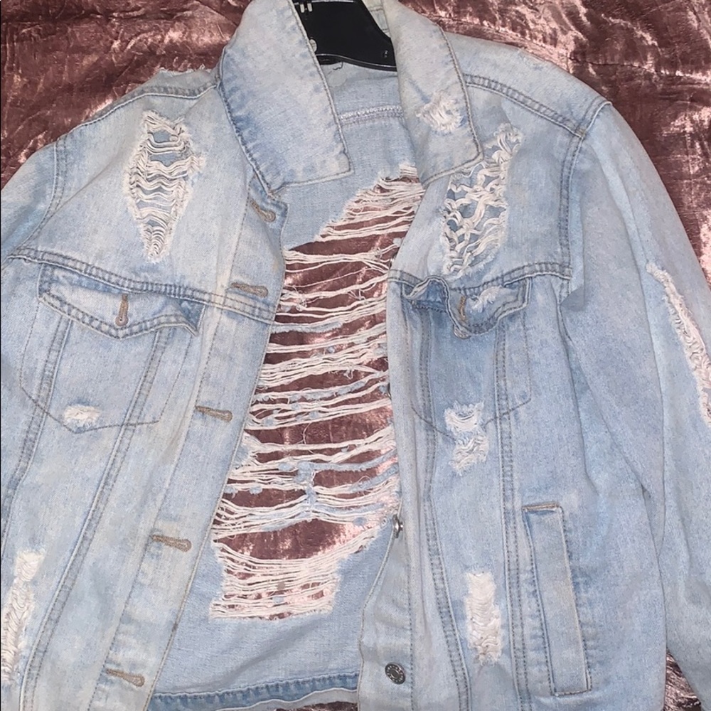 Ripped denim jacket
